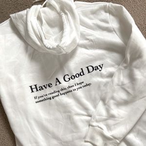 White hoodie- “Have a good day”